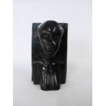 Carved ebony bust of an African lady, 22cm high