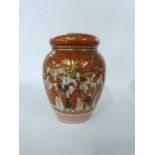 Japanese porcelain jar and cover, the tangerine ground decorated with sages, cover with gilt