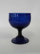 Early 19th Century blue glass bowl on domed foot, 14cm high