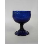 Early 19th Century blue glass bowl on domed foot, 14cm high