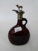 Bristol amethyst coloured glass decanter with white metal top and cover, 21cm high