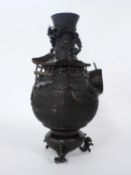 Japanese bronze vase decorated in relief with a sailing boat or Sampan with houses and foliage in