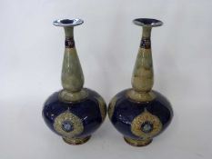 Large pair of Royal Doulton Art Nouveau vases, the blue ground with applied florets in Art Nouveau