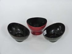 Group of three flambe type shaped Royal Doulton bowls, 14cm long