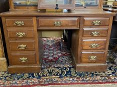 Late 19th Century American walnut twin pedestal desk or dressing table fitted with nine drawers,