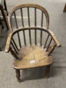 Small 19th Century elm seated child's Windsor type chair with hooped stick back and turned legs,