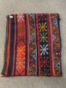 Two vintage carpet saddlebags, the largest 23 x 27 inches (2)