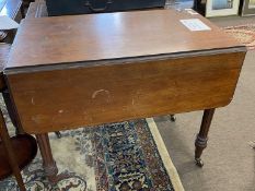 A 19th Century Gillows Pembroke style mahogany drop leaf table with reeded legs, single end drawer