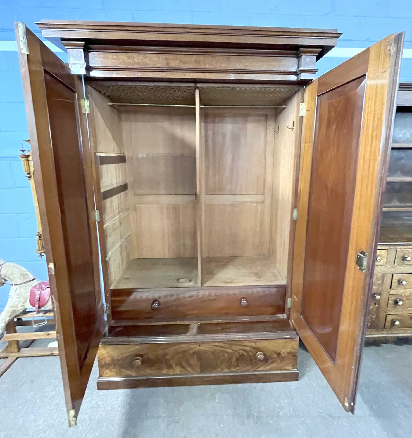 A large Victorian mahogany wardrobe with architectural cornice over two panelled doors and a base, - Image 4 of 5