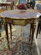Reproduction French Empire style side table with oval top raised on tapering legs, decorated