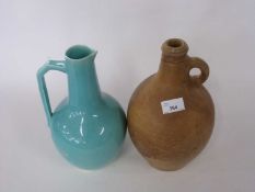 A stone ware buff flask, 18th Century together with a turquoise ground ewer with angular handle,