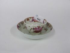 Lowestoft porcelain tea bowl and saucer, circa 1780 decorated in Famille Rose style with floral