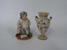 Staffordshire figure of a Vintner or Jolly Toby on shaped base, 17cm high together with a vase in