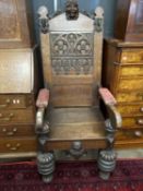Large 19th Century Gothic style throne, the back with applied carved detail and tracery, 140cm high