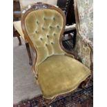 A Victorian button upholstered nursing chair with carved showwood frame, 90cm high