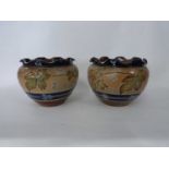 Pair of Royal Doulton jardinieres with crimped rims, the body with applied floral decoration on a