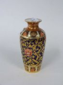 Copeland Spode vase decorated in Crown Derby style with an Imari design, 15cm high