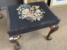 A Georgian style stool of rectangular form with tapestry top raised on cabriole legs with ball and