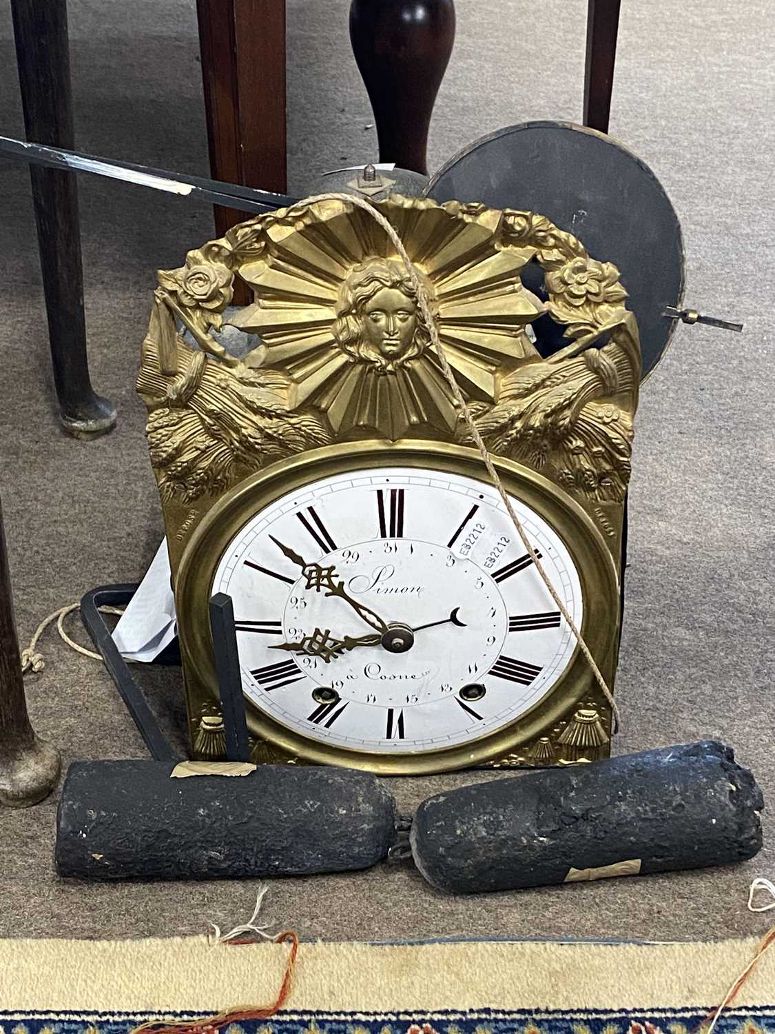 French Comptoise brass cased wall clock with white enamel dial, signed Simon A Cosne together with