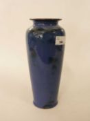 An unusual Royal Doulton blue ground vase with brown smudged decoration, 27cm high