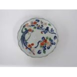 Japanese porcelain dish with shaped rim decorated with polychrome design of floral sprays (some