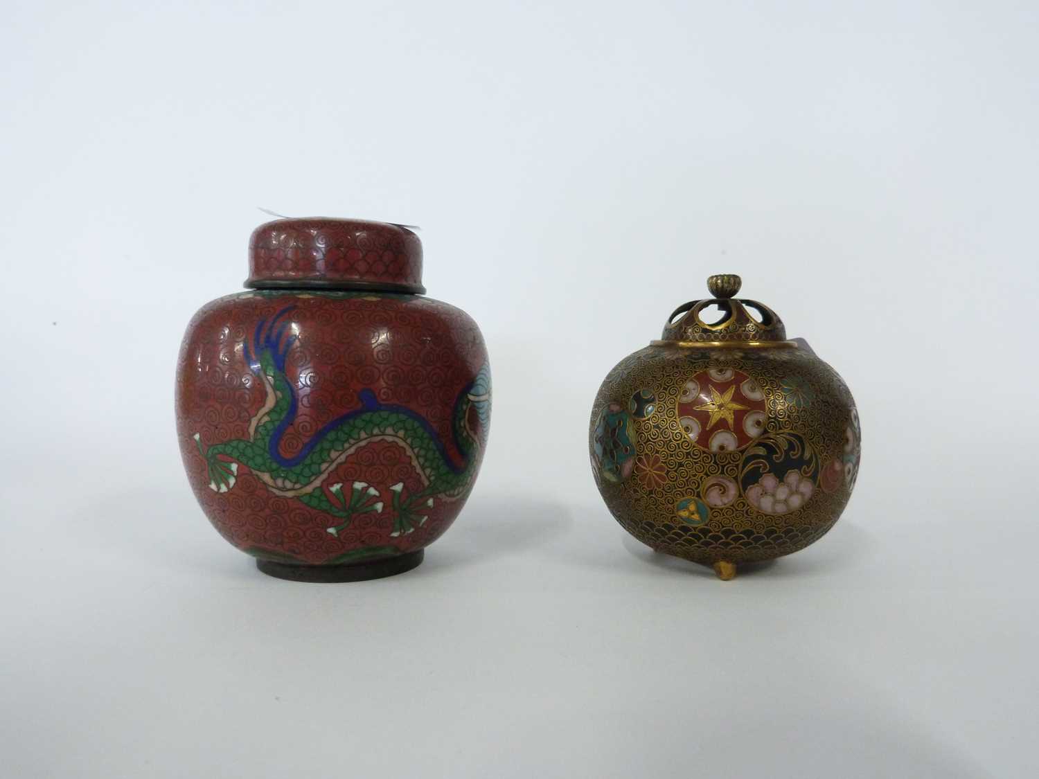 Cloisonne incense burner of globular form with pierced cover together with a small Cloisonne jar and