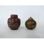 Cloisonne incense burner of globular form with pierced cover together with a small Cloisonne jar and