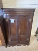 Georgian oak wall mounted corner cabinet with two panelled doors opening to a blue painted interior,