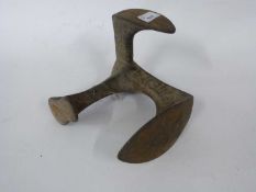 Metal boot scraper marked Empire