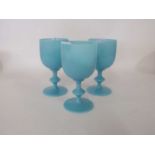 Group of three late 19th Century glass rummers in a pale blue colour, the large bowl above a stem