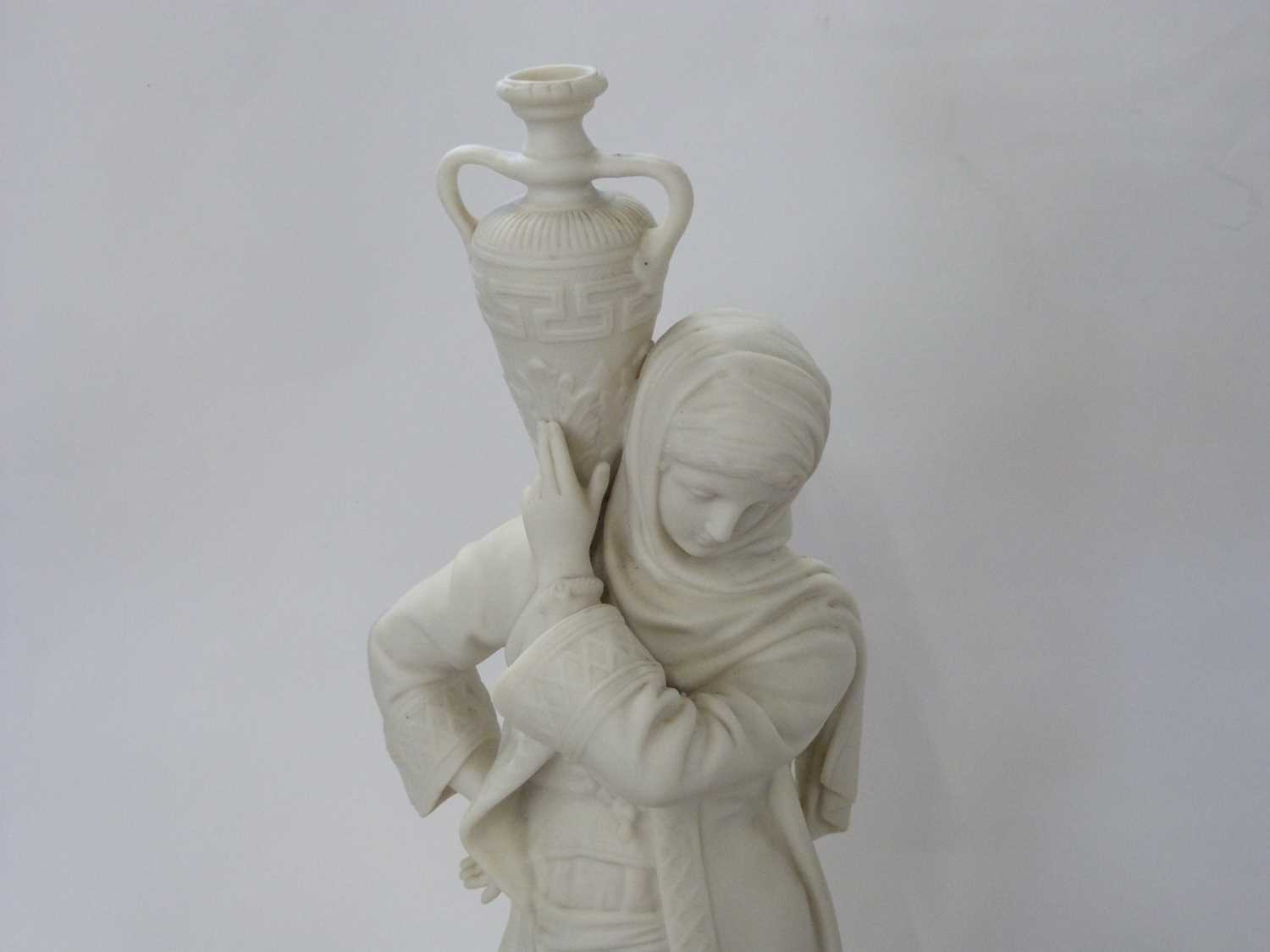 A Royal Worcester style parian figure of a water carrier on circular base, 42cm high - Image 2 of 2