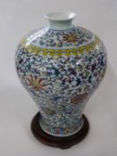 Large Chinese porcelain Meiping vase, the baluster body with a polychrome scrolling design beneath