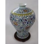 Large Chinese porcelain Meiping vase, the baluster body with a polychrome scrolling design beneath