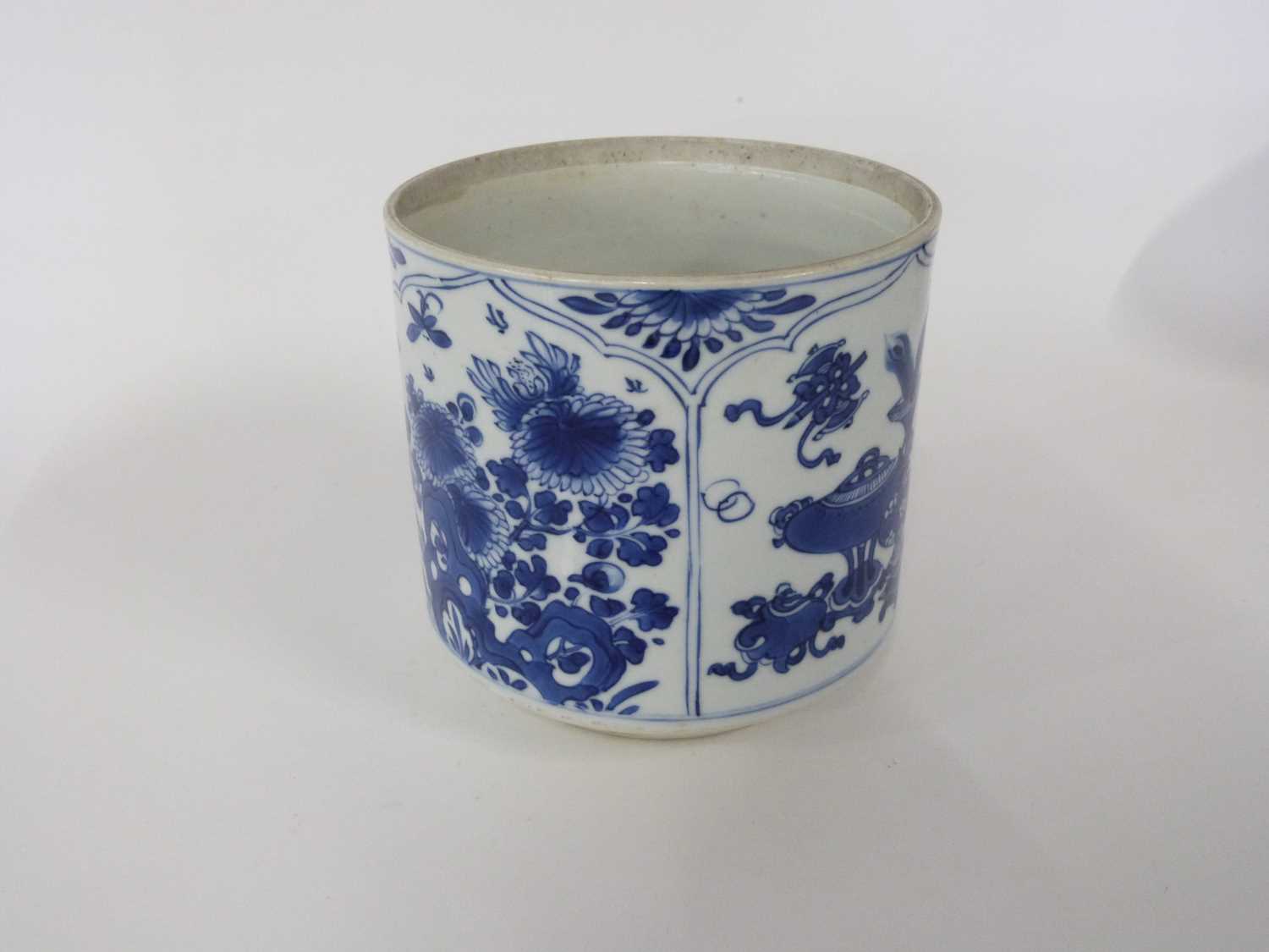 Chinese porcelain pot with blue and white panels of precious objects and flowers in Kangxi styleGood