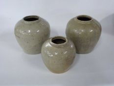 Group of three Chinese provincial pottery jars with grey glaze, largest 18cm high