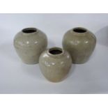 Group of three Chinese provincial pottery jars with grey glaze, largest 18cm high