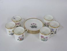 Royal Worcester coffee set comprising six coffee cans and saucers all with printed and painted