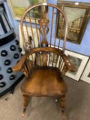 Good quality 20th Century oak rocking chair with arched stick back, 118cm high