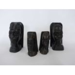 Group of ebony carved bookends together with smaller examples (4), largest 19cm high