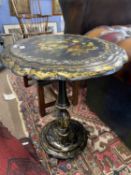Victorian papier mache black lacquer and mother of pearl inlaid occasional table, the top set with a