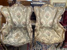 A pair of 19th Century gilt wood framed armchairs, for restoration, 107cm high