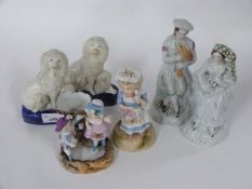 Group of English continental porcelain figures including a pair of Staffordshire figures, a pair