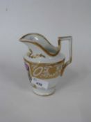 Continental porcelain jug, probably Paris, the centre painted with floral sprays with gilt