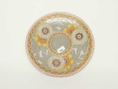 Charlotte Rhead Crown Ducal charger with a Persian rose tube lined design, factory mark and