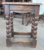 Reproduction oak joint stool on bobbin turned frame, 39cm wide