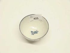 A Worcester porcelain tea bowl, 18th Century, decorated with a blue design of fruit