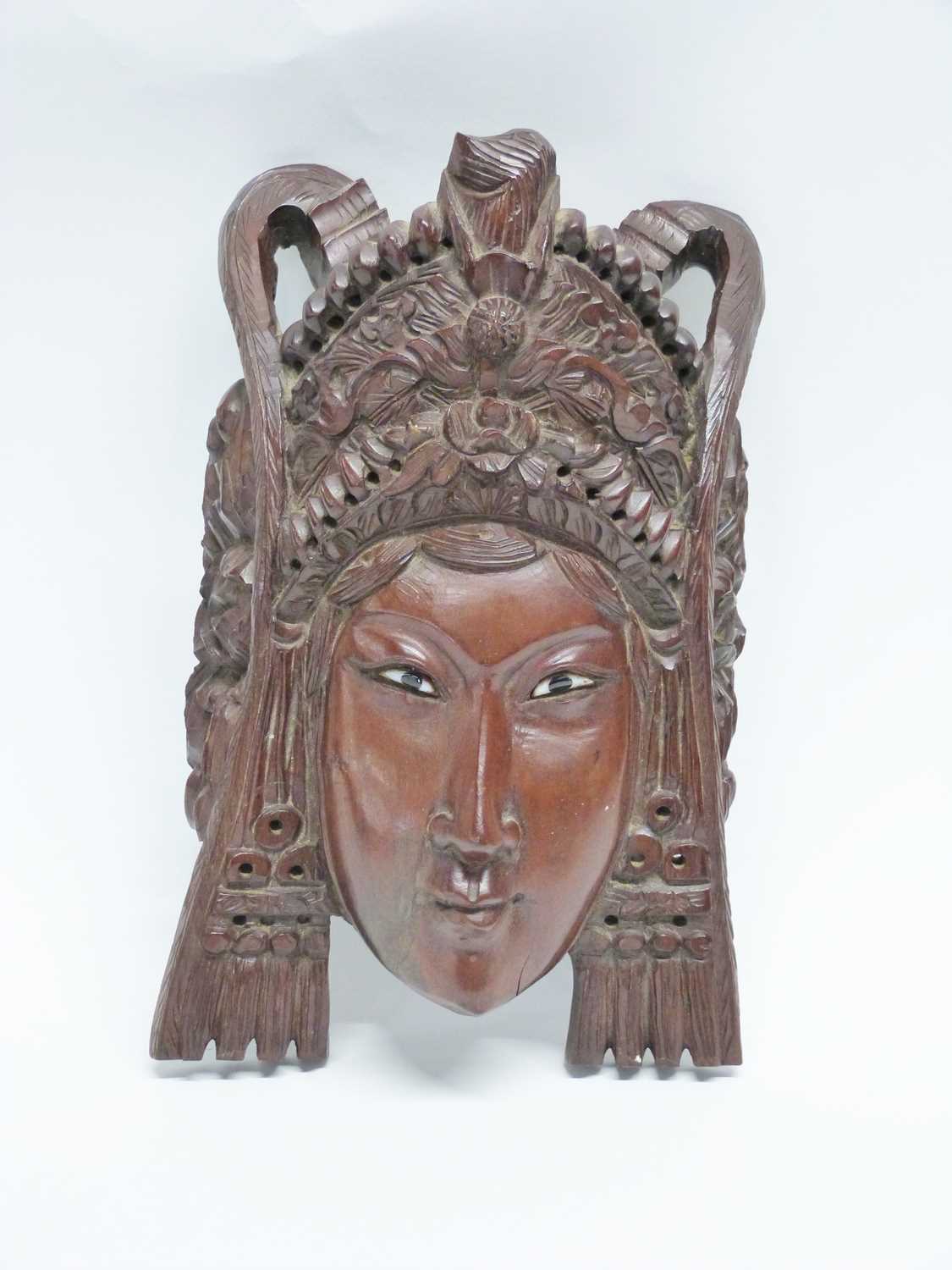 Group of four wooden carved masks, probably Balinese of various deitys - Image 3 of 5