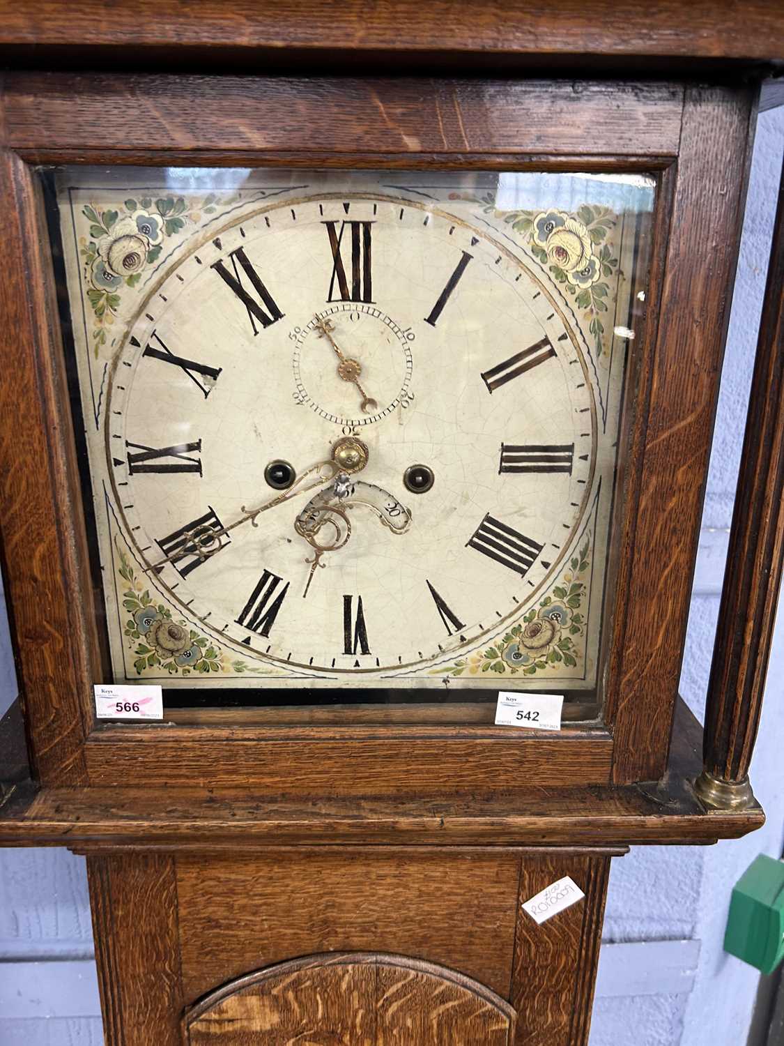 Georgian long case clock with unsigned floral painted dial, with an eight day movement, set in a oak - Image 2 of 2