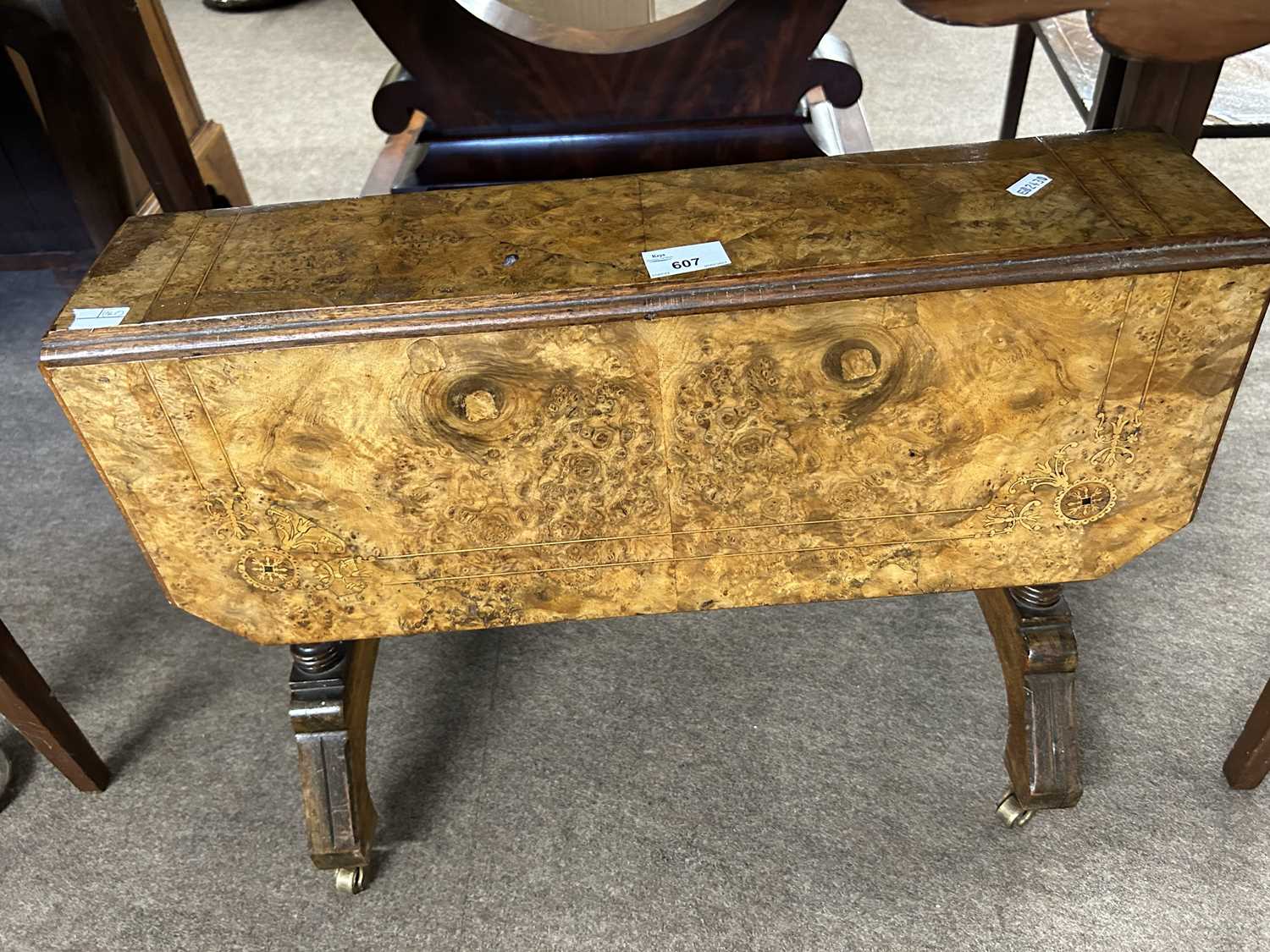 A small burr walnut veneered Sutherland style drop leaf occasional table, 57cm wide