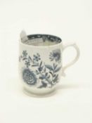 A small Lowestoft porcelain bell shaped mug, circa 1765 with a floral design and butterflies (a/f)